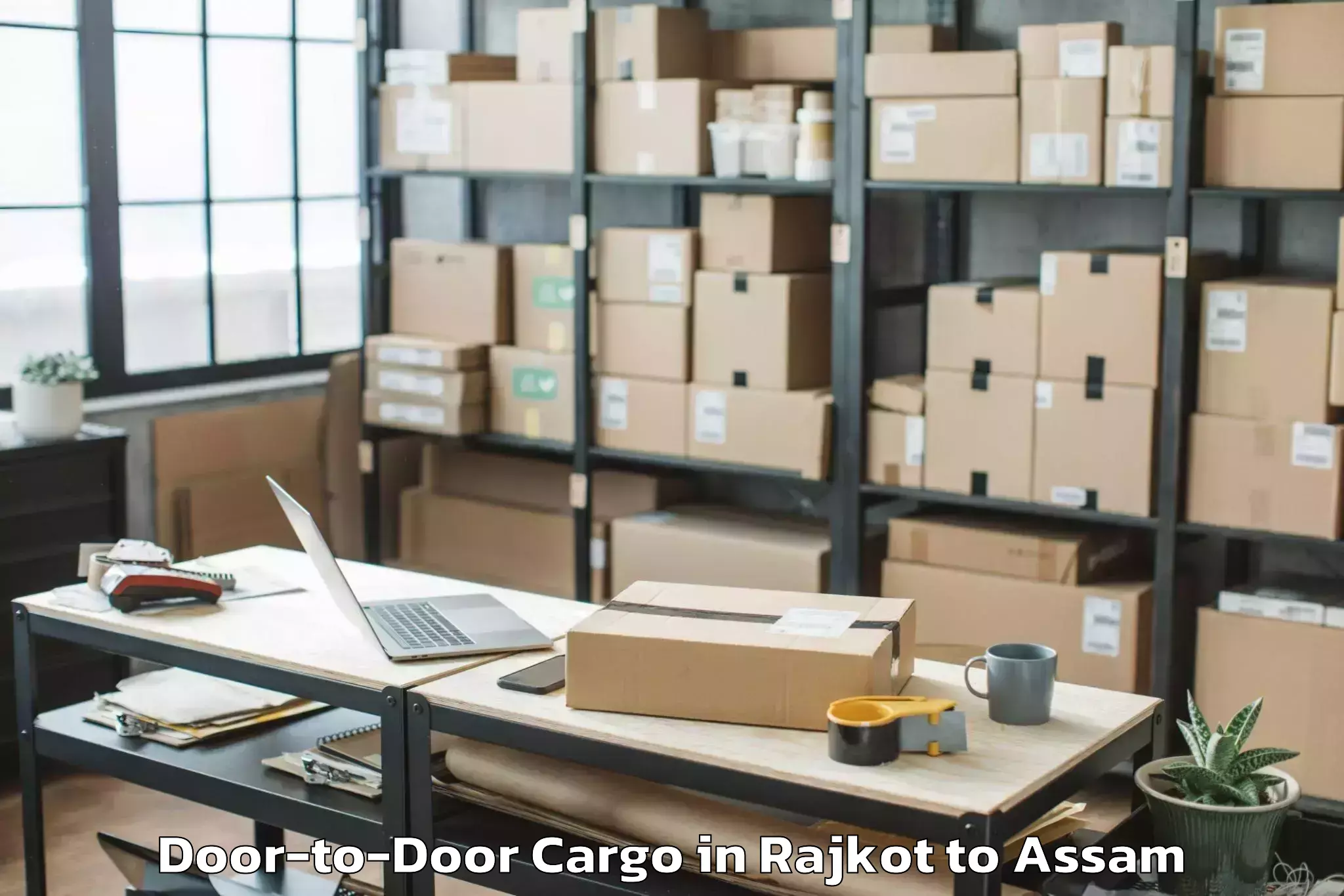 Top Rajkot to Sorbhog Door To Door Cargo Available